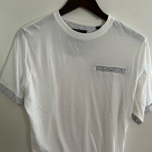 Men’s Knit Heritage tee with anchor print on sleeve